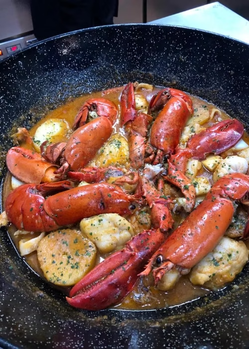 Restaurante Maluquer Quattro bogavante en salsa marinera en Valencia